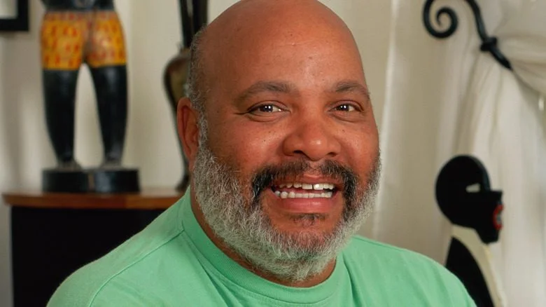 James Avery with beard green shirt smiling