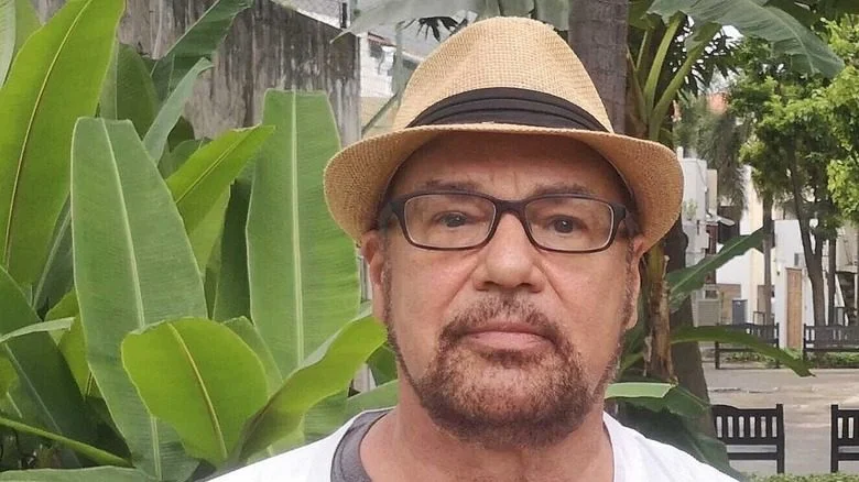 Jonathan Kochmer glasses straw fedora