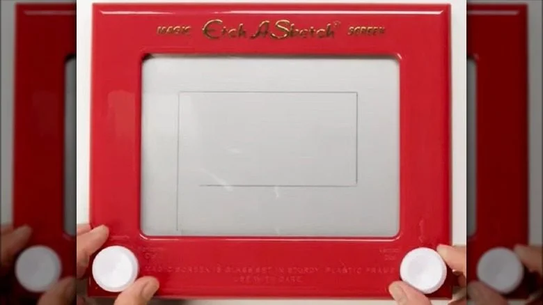 sketching on Etch A Sketch