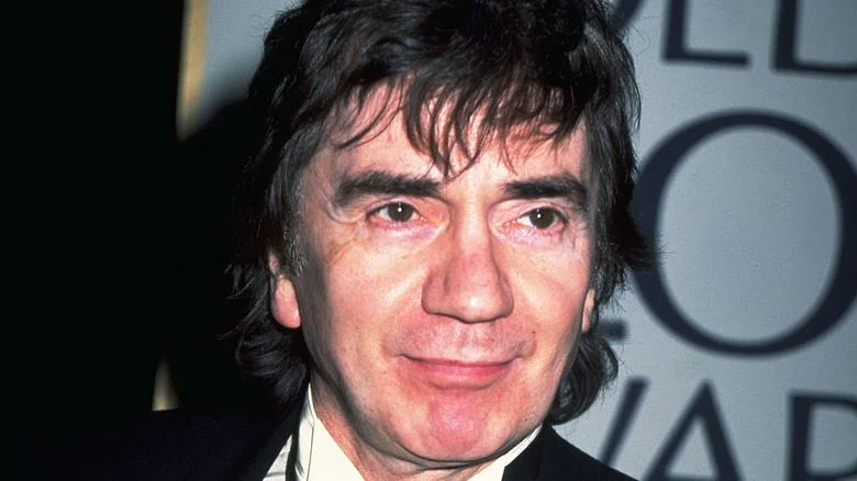Dudley Moore souriant à un événement