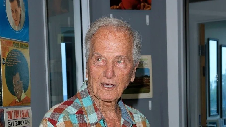 Pat Boone looking colorful shirt talking