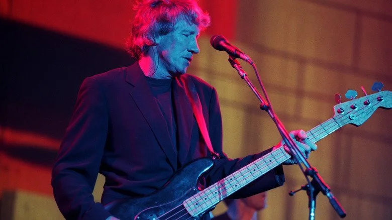 Roger Waters playing guitar