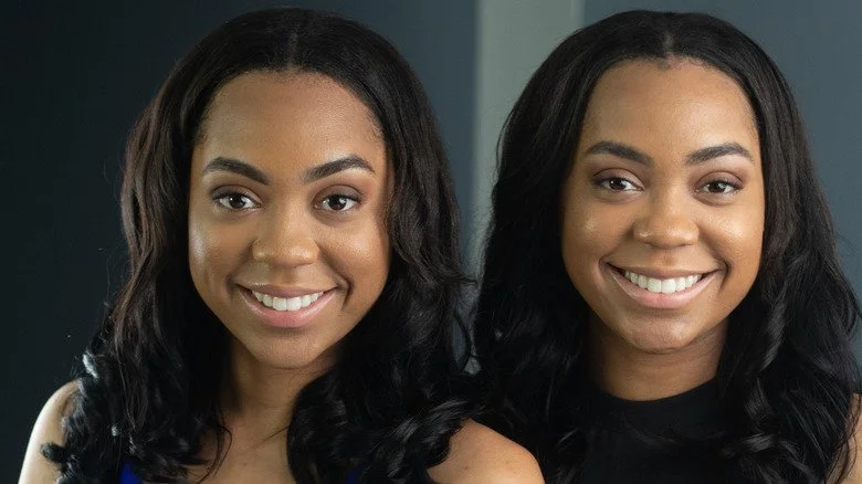 Twin women smiling