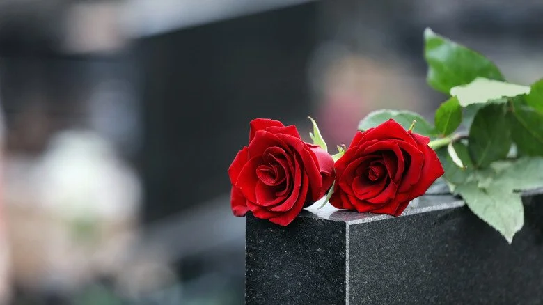 flowers on tombstone
