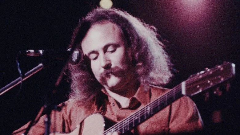 David Crosby plays guitar