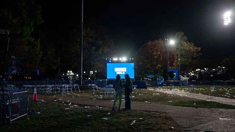 Harris supporters starting at election screen