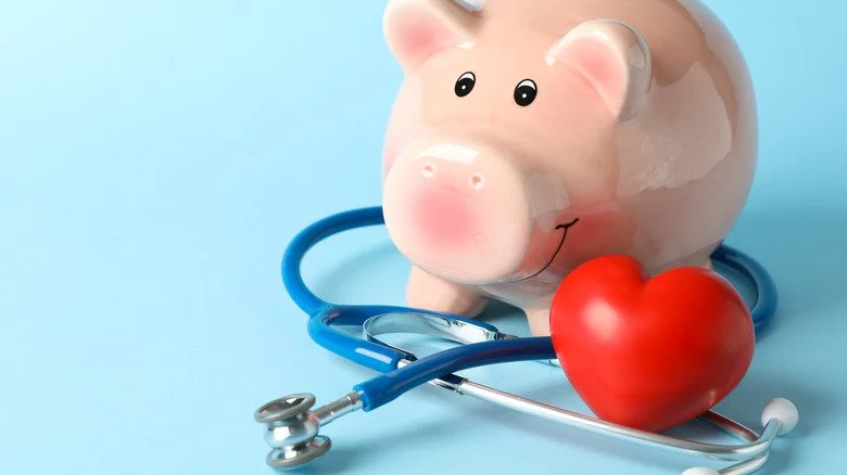 Piggy bank, heart, stethoscope
