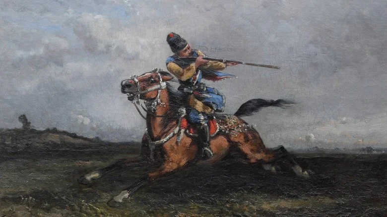 Cavalier circassien tenant une arme