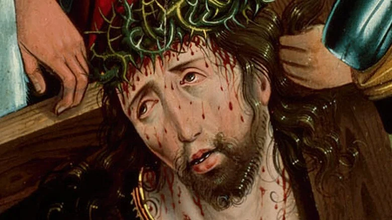 Jésus portant une croix