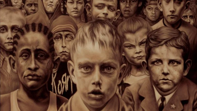 Artwork de l'album Untouchables de Korn mettant en avant des enfants sur la couverture