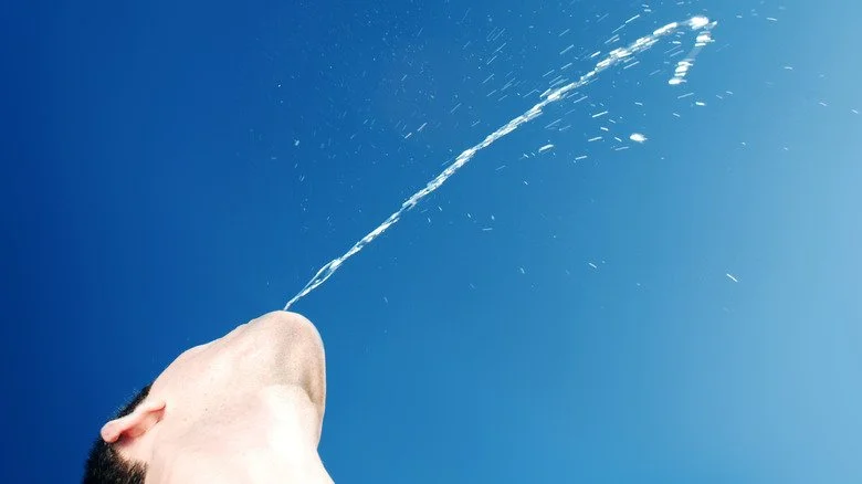 Dude spitting into the sky