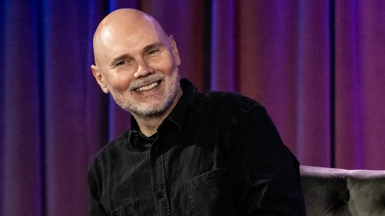 Billy Corgan souriant lors d'un événement en 2023
