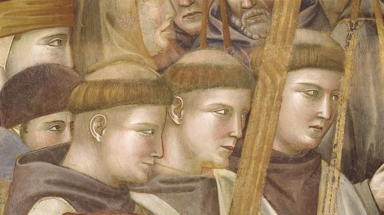 image de trois moines tonsurés