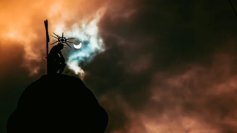 Jésus assis et éclipse solaire