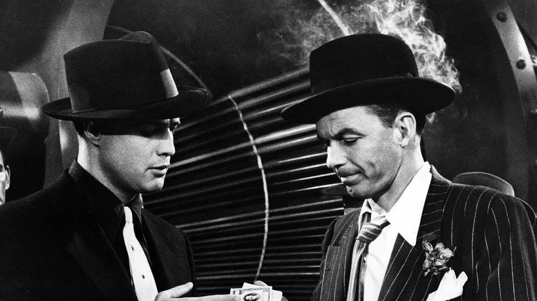 Marlon Brando collects money from Frank Sinatra