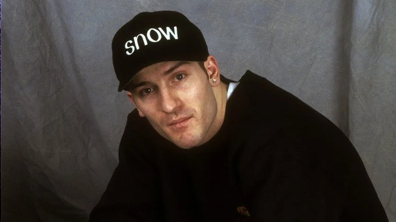 Snow poses for photo