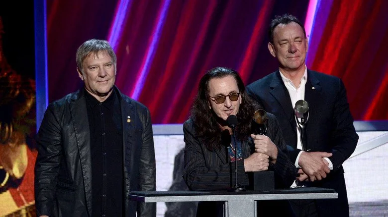 Rush lors de leur intronisation au Rock and Roll Hall of Fame