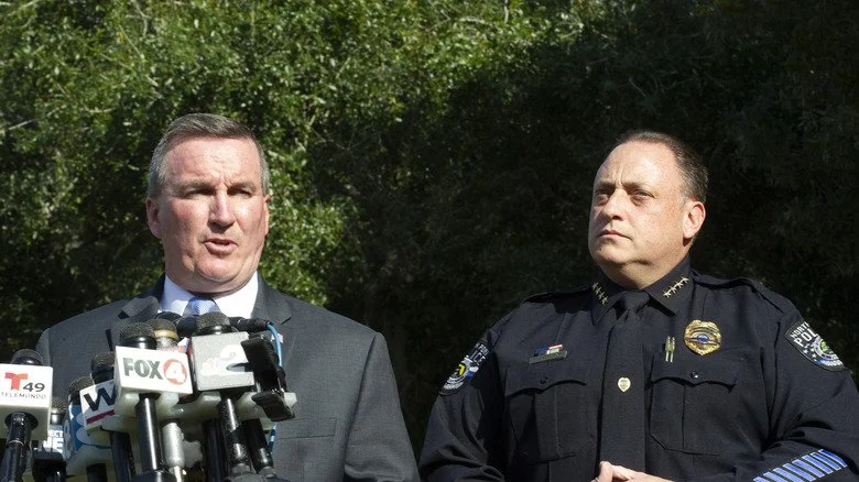 Investigators on podium announcing the discovery of Brian Laundrie's body and possessions