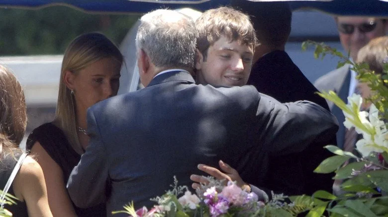 john and burke ramsey embrace