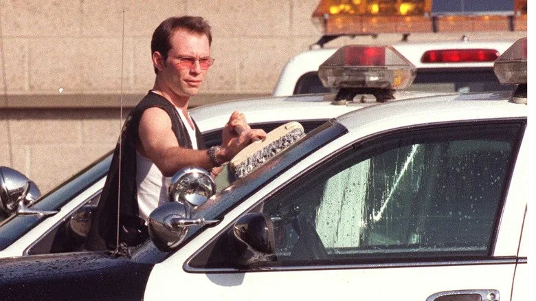 Christian Slater washing police cars while serving jail term