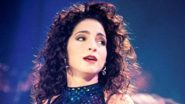 Gloria Estefan in glittery dress onstage in 1991