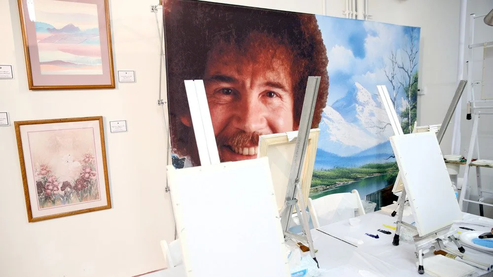 Peinture de Bob Ross lors d'une exposition d'art