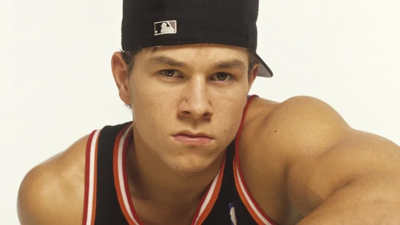 Mark Wahlberg as Marky Mark posing in cap
