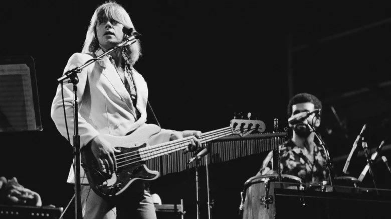 Peter Cetera and Laudir de Oliveira perform on stage together as members of the band Chicago in 1978