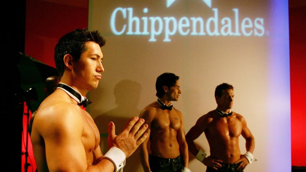 Danseurs Chippendales posant pour des photos