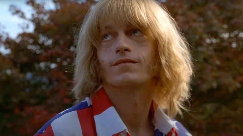 Actor Leo Gregory portraying Rolling Stones member Brian Jones outdoors in movie Stoned