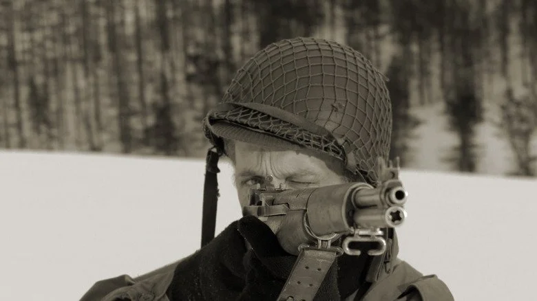 WW2 reenactor wearing M1 helmet