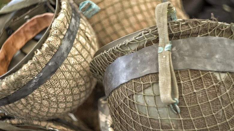 M1 helmets hanging upside down