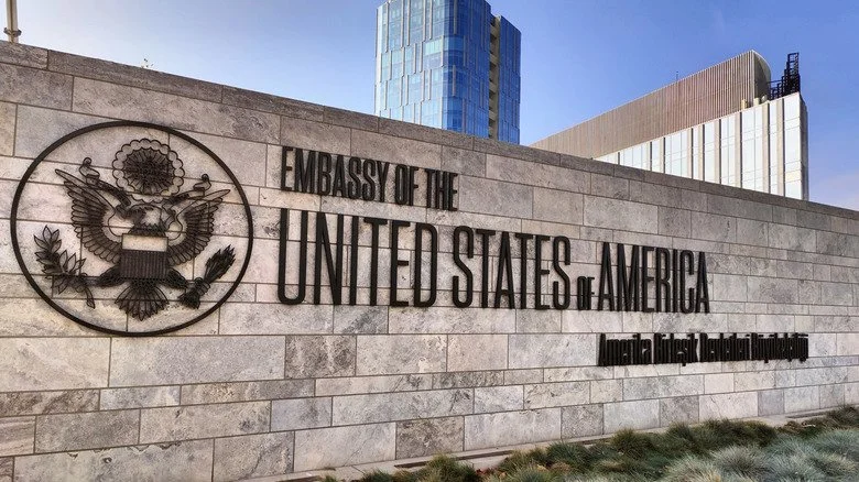 U.S. embassy sign on wall