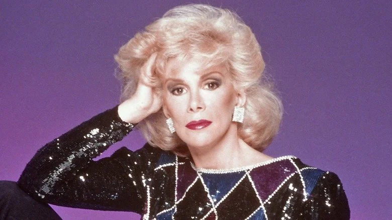 Joan Rivers with hand on hair in 1980s publicity photo