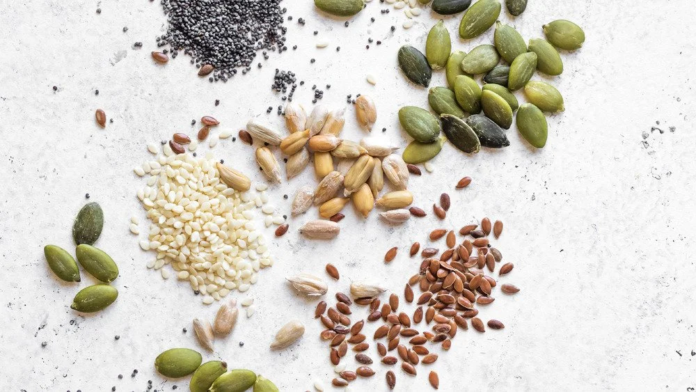 Graines et noix utilisées dans le rituel de préparation