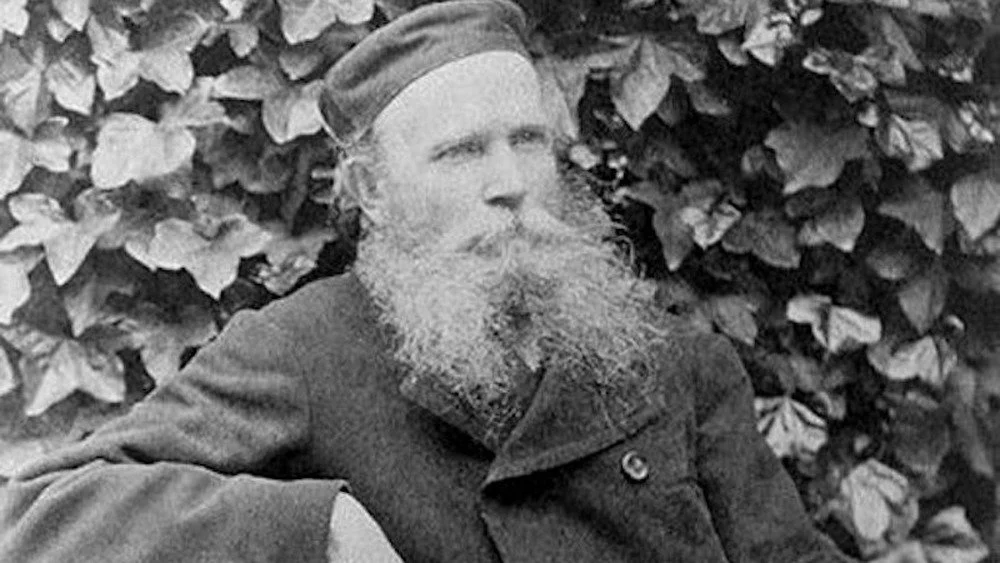 William Chester Minor assis pour un portrait