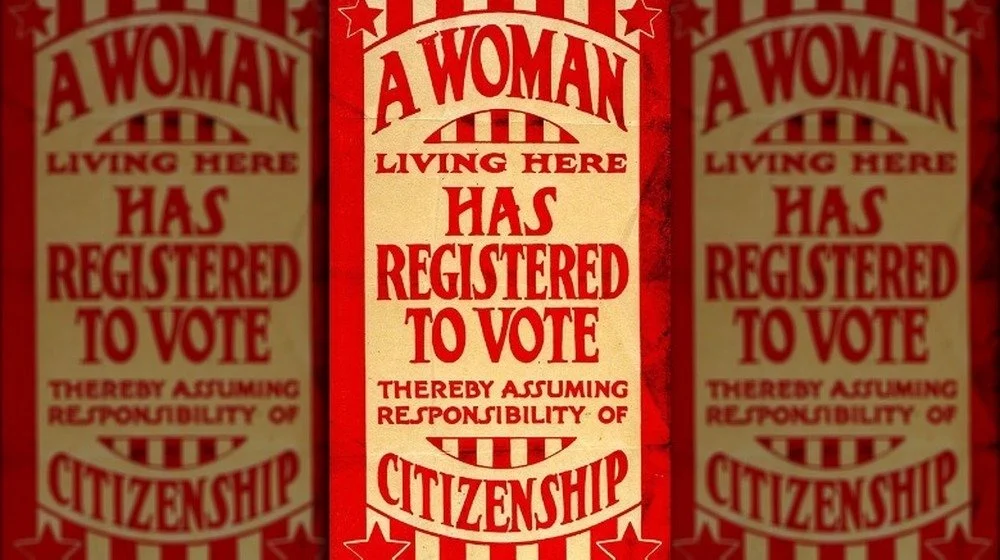 Pancarte : Une femme habitant ici s'est inscrite pour voter