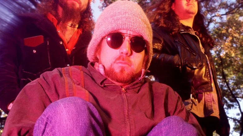 Nick Pollock avec un bonnet et des lunettes de soleil