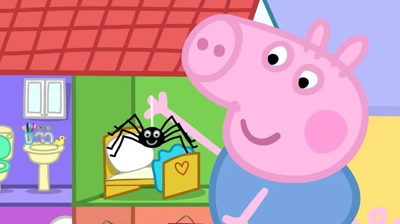Peppa Pig jouant avec une araignée souriante