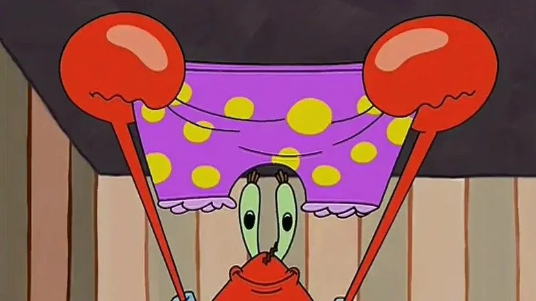 Mr. Krabs souriant tenant une paire de culottes