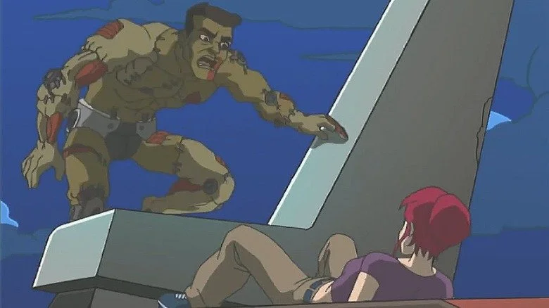 Baxter Stockman menaçant April O'Neil dans son corps cloné