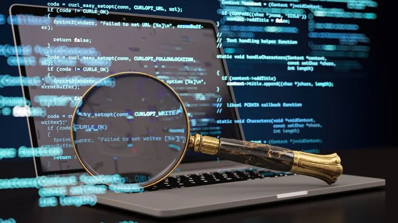 Ordinateur portable avec loupe et code de données