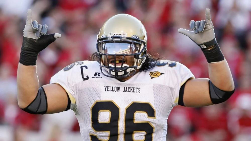 Roman Reigns jeune joueur de football