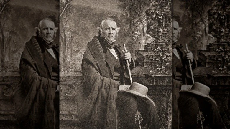 Sam Houston pose avec un chapeau et une canne