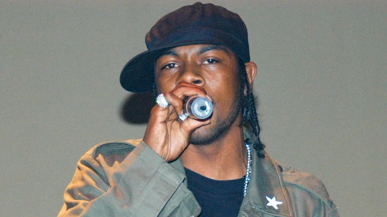 Static Major performing into microphone