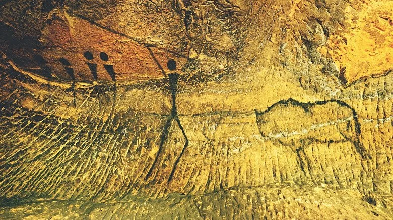 Illustration d'un humain préhistorique avec une lance