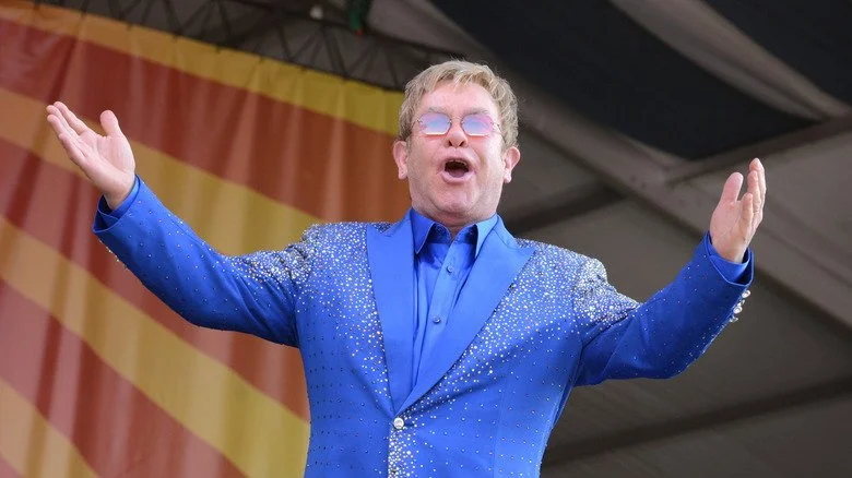 Elton John performs at a festival