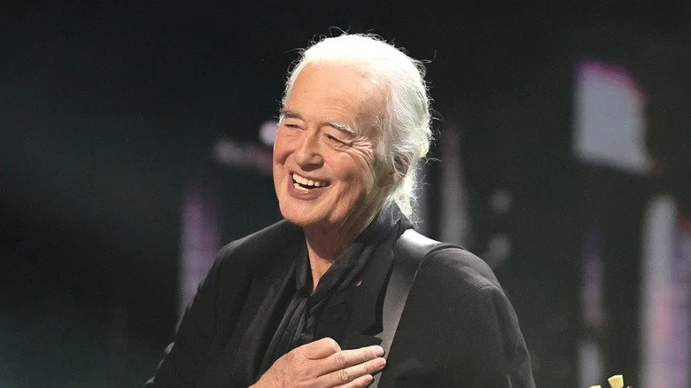 Jimmy Page performs at a concert
