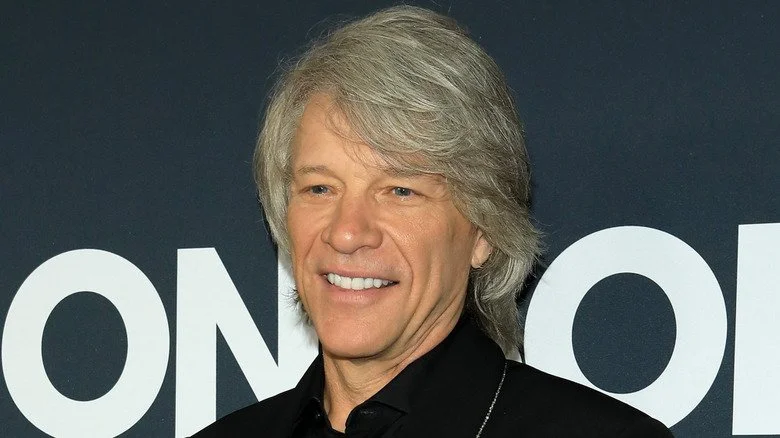 Jon Bon Jovi souriant lors d'un événement