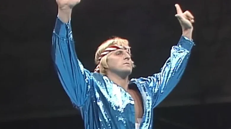 Owen Hart en tenue de lutte dans le ring